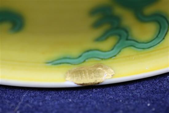 A Chinese yellow and green enamelled dragon bowl, Qianlong seal mark and of the period (1736-95) D. 15.5cm, faults